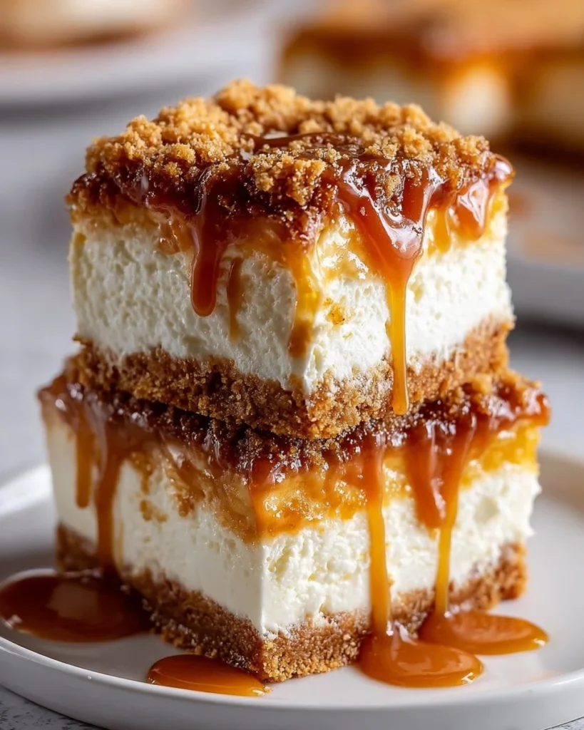 Butterscotch graham cracker cheesecake bars on a dessert plate