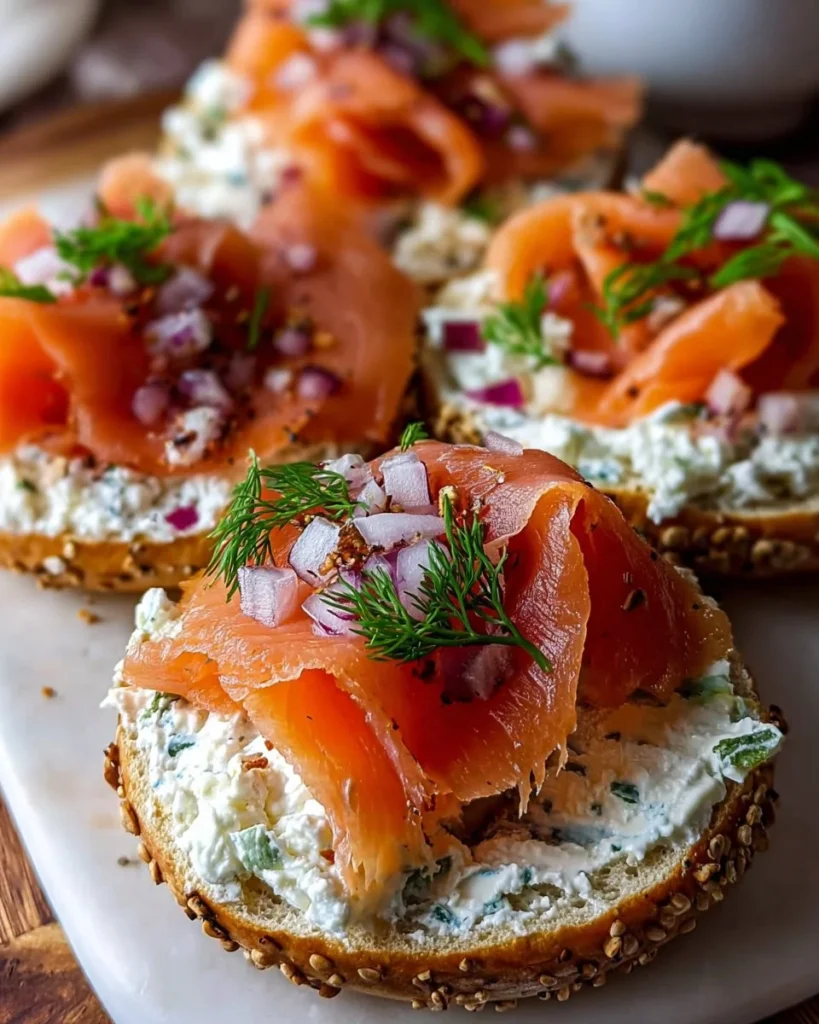 Cottage Cheese Bagels topped with smoked salmon and fresh herbs