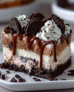 Homemade copycat Dairy Queen ice cream cake with chocolate and vanilla layers.