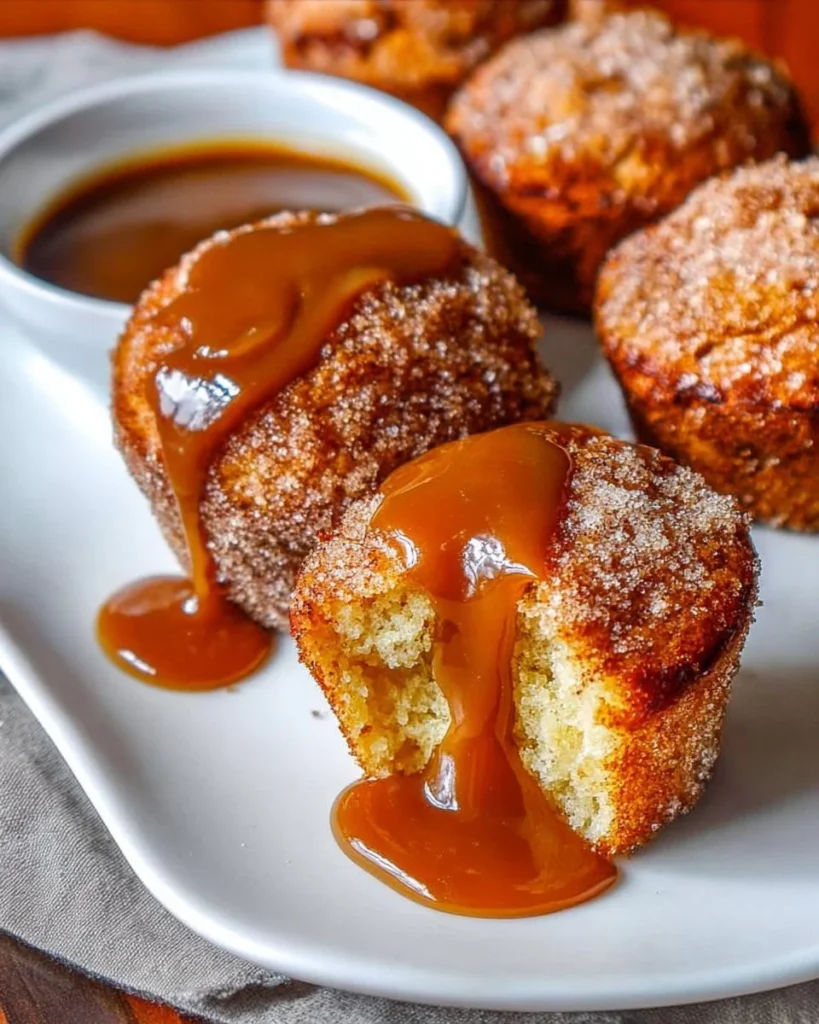 Freshly baked churro muffins coated in cinnamon sugar