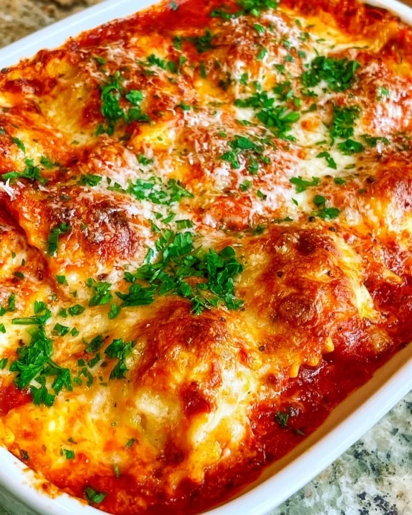 Cheesy Ravioli Lasagna Casserole with layers of melted cheese and pasta